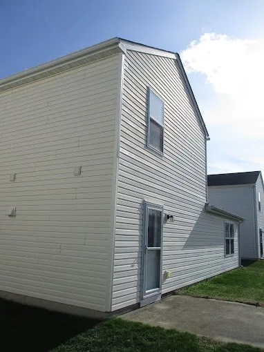 New siding installed on a two-story St. Louis home